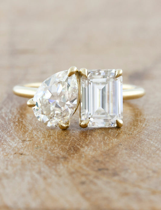 caption:Shown with 1.2ct pear & 1.75ct emerald cut diamonds in 14k yellow gold