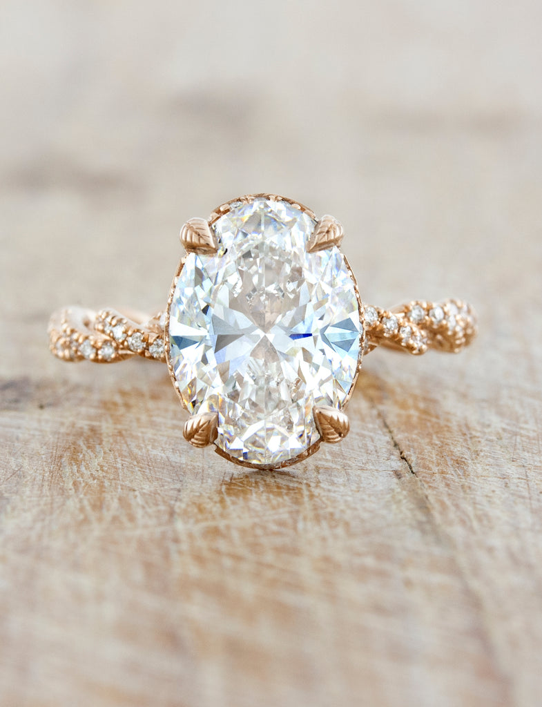 caption:Shown with a 3.20ct oval diamond in 14k rose gold