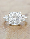 caption:Shown with 4ct cushion cut diamond in platinum