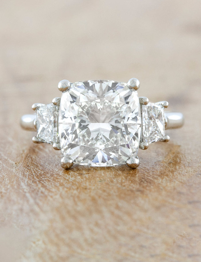 caption:Shown with 4ct cushion cut diamond in platinum