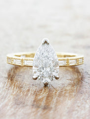 caption:1.20ct pear diamond in two toned setting