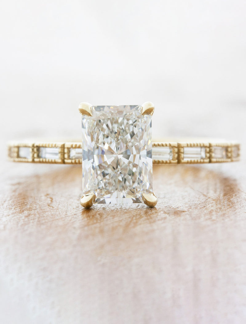 caption:Shown with 1.85ct radiant cut diamond in 14k yellow gold