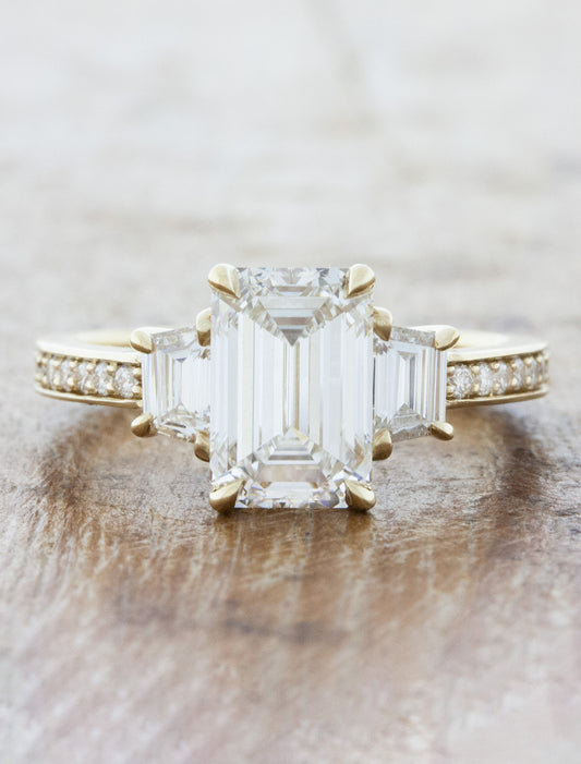 caption:Shown with 2.0ct emerald cut diamond in 14k yellow gold