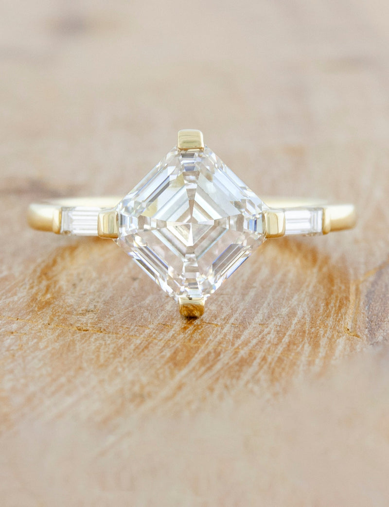 caption:Shown with 3ct asscher cut diamond in 14k yellow gold