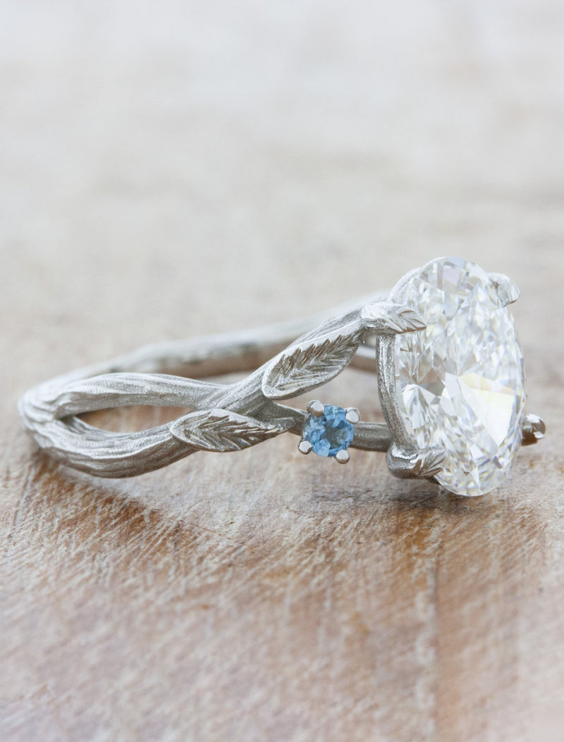 caption:Customized with aquamarine accents in platium 