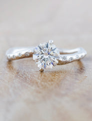 caption:Shown with 1.25ct diamond in 14k white gold option