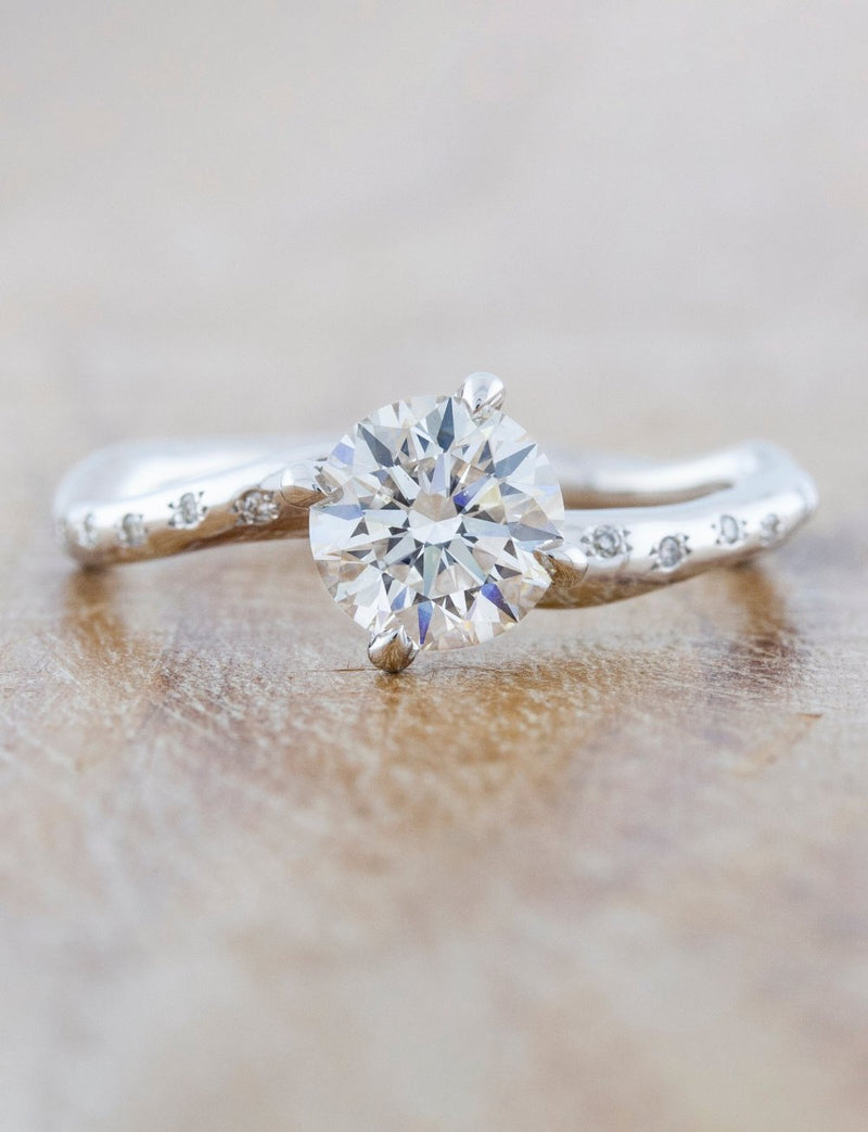caption:Shown with 1.25ct diamond in 14k white gold