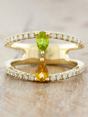 caption:pear shaped birthstones in 14k yellow gold