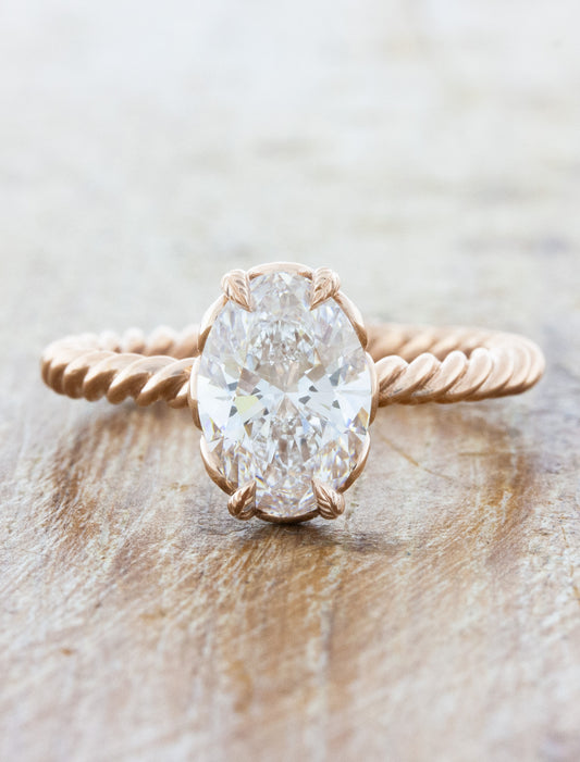 caption:Shown with 1.70ct oval diamond in 14k rose gold