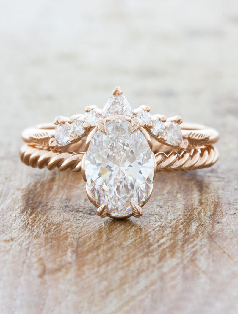 caption:Stacked with Kya wedding band in 14k rose gold
