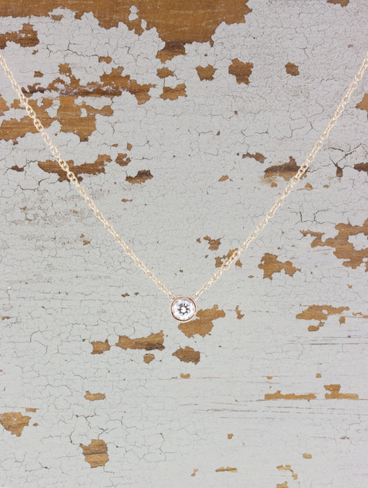 caption:Shown with 0.10ct round diamond in 14k rose gold