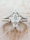 caption:Stacked with Kia wedding band in platinum