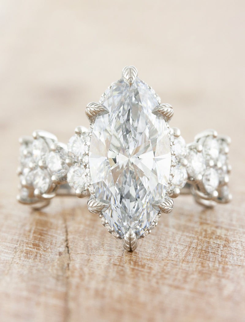 caption:Shown with 3ct marquise diamond in platinum
