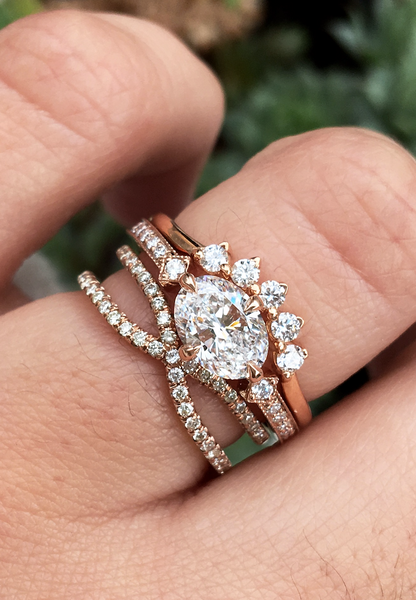 caption:Shown here with Antoinette (top), and Zara (bottom) wedding bands.