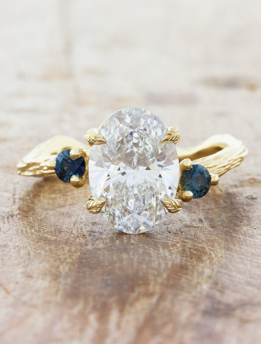 caption:Shown with 2.50ct oval diamond in 14k yellow gold