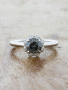 caption:Shown with 0.65ct round salt & pepper diamond in platinum