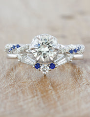 caption:Shown with custom version of our Constance engagement ring