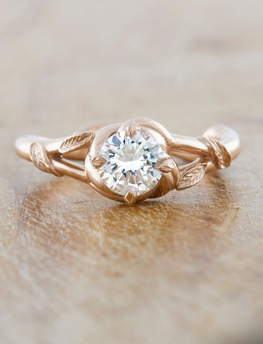 caption:Shown with 0.70ct round diamond in 14k rose gold