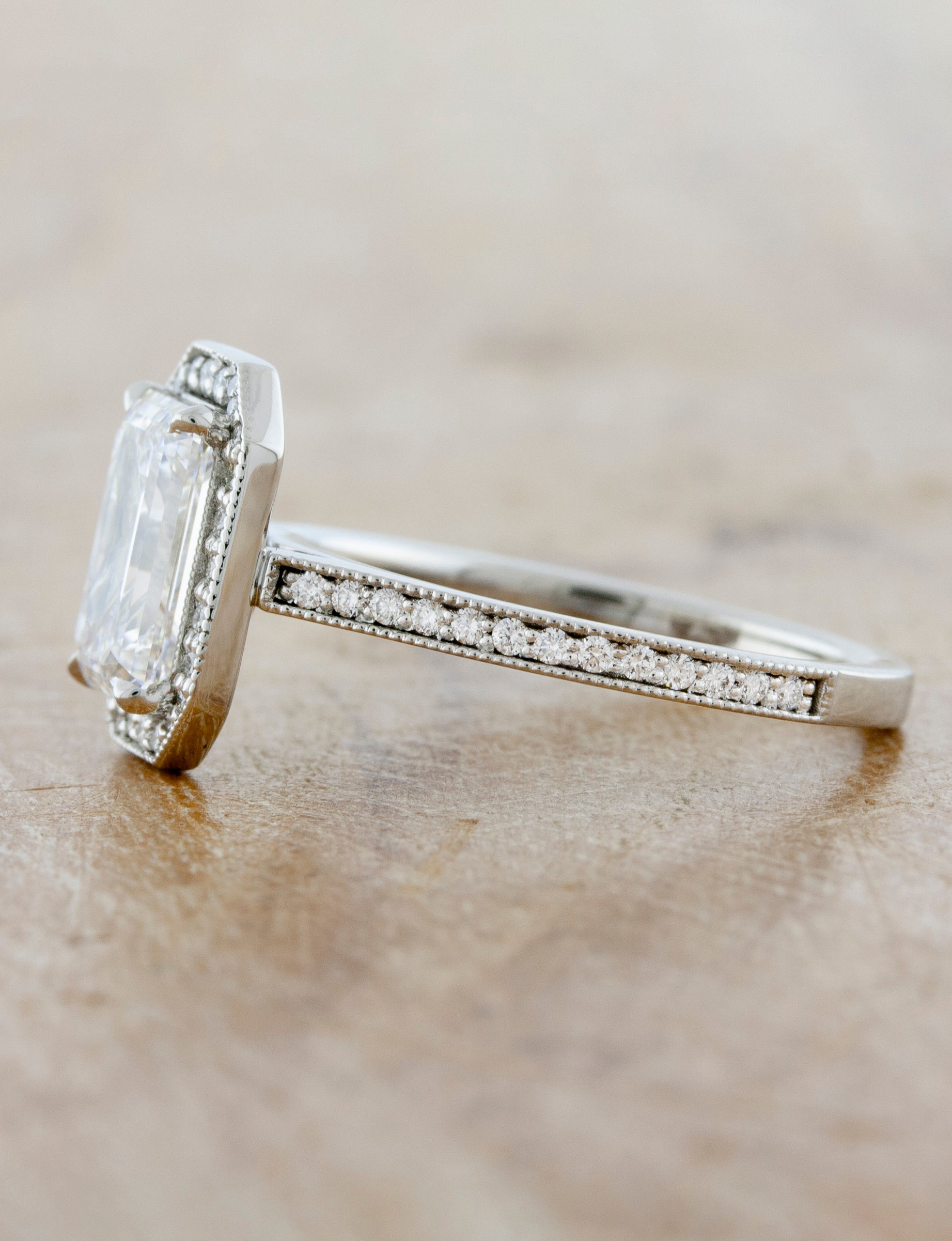 caption:Shown in platinum with a 2.3ct center diamond