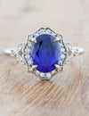 caption:Customized with blue sapphire in platinum