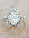 caption:Shown with 1.50 carat center diamond in platinum