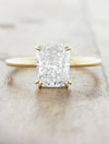 caption:Shown in 14k yellow gold option with 1.5ct center stone