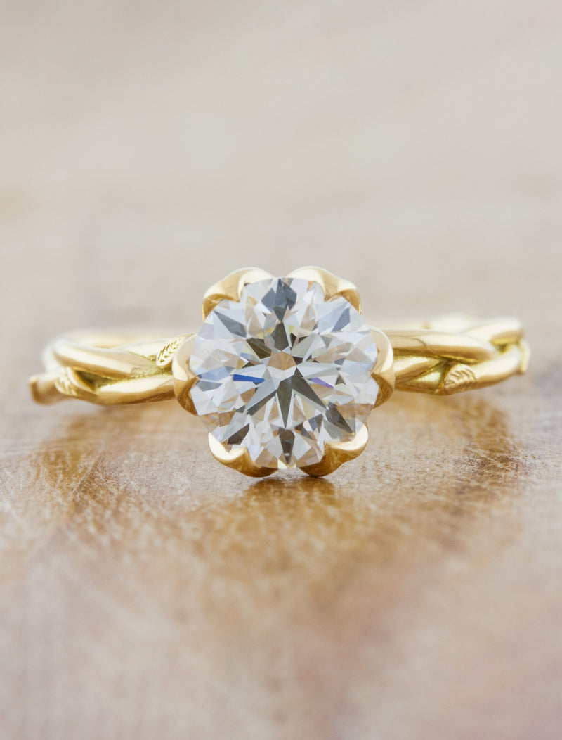 caption:Shown with 1.50ct round diamond in 18k yellow gold