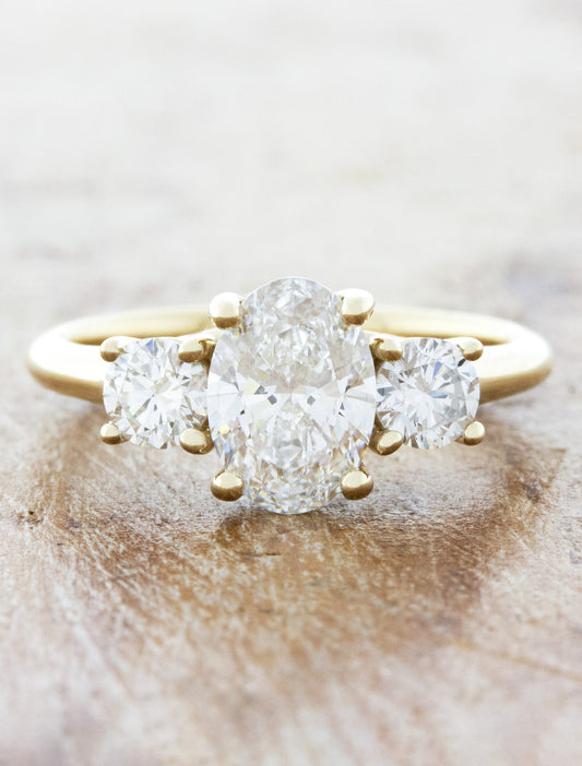 caption:Shown with 1.0ct oval diamond in 14k yellow gold