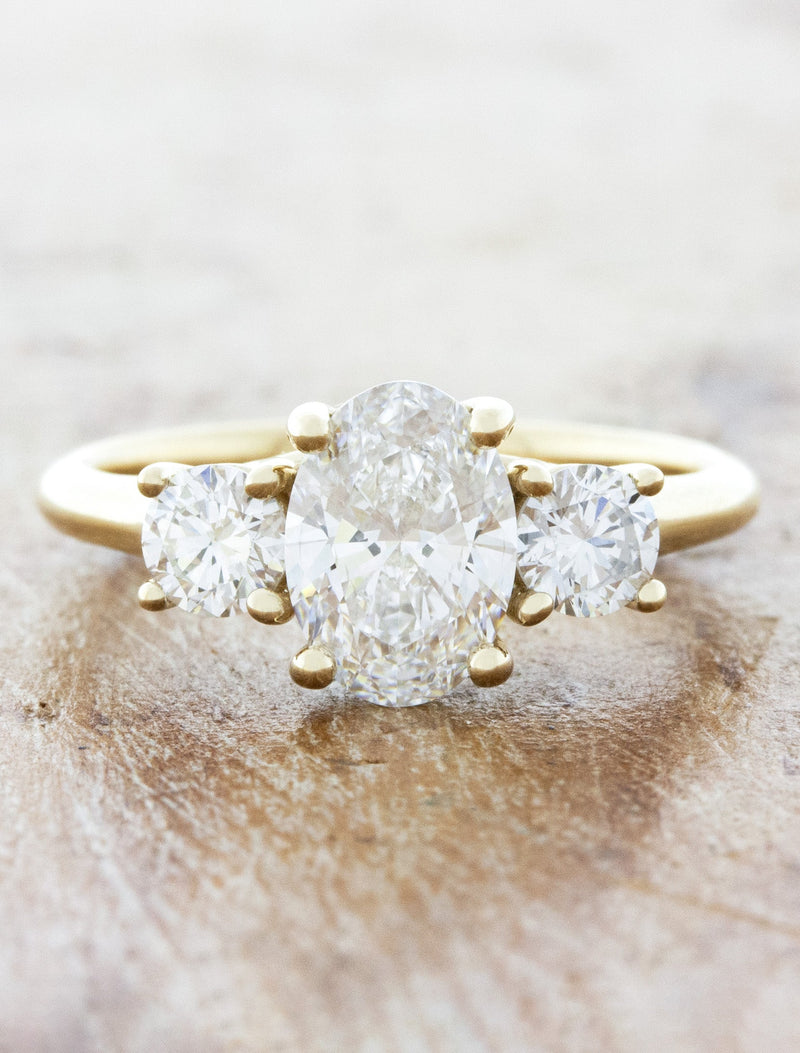caption:Shown with 1.0ct oval diamond in 14k yellow gold