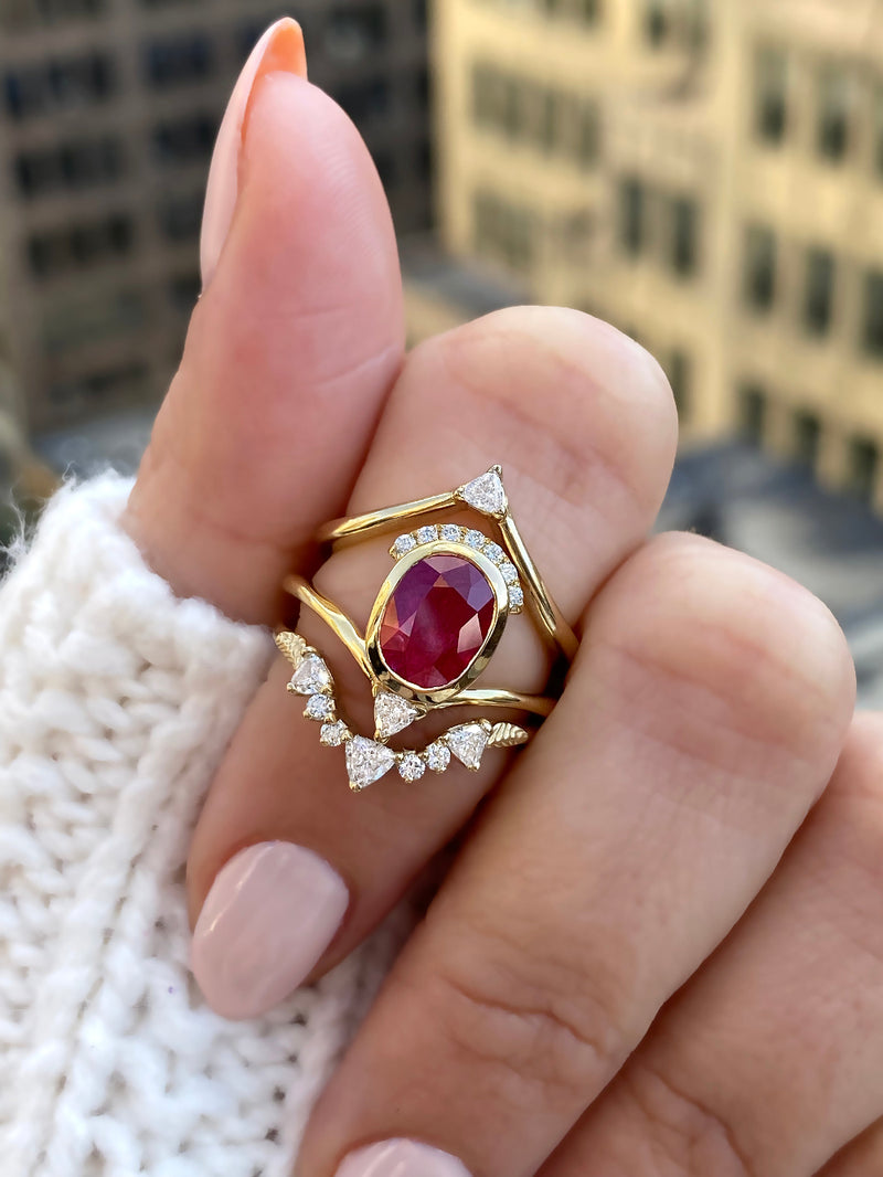 caption:Stacked with Kya & Jaylen wedding bands in 14k yellow gold