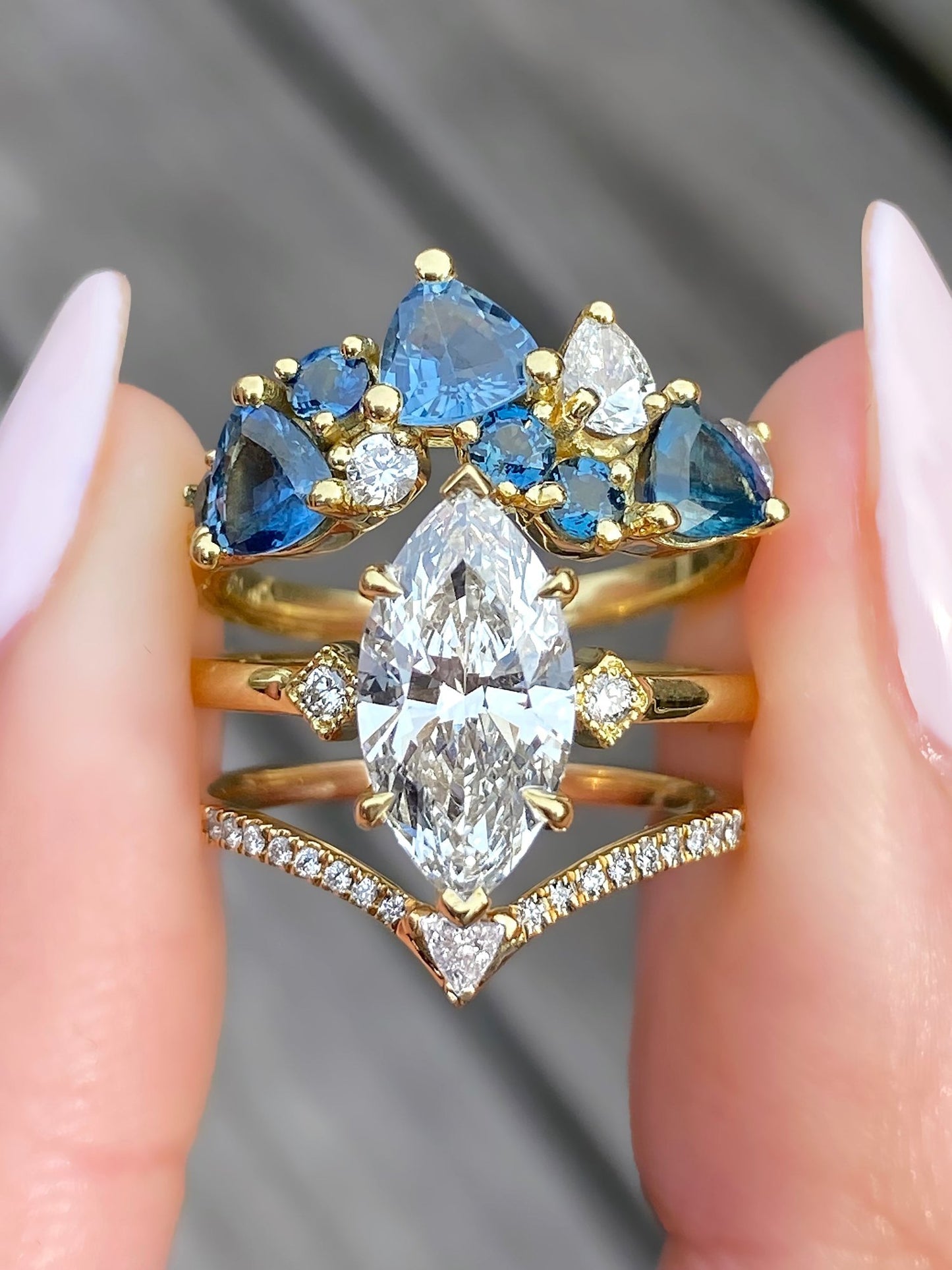 caption:Shown in 14k yellow gold with 1.7ct marquise center diamond