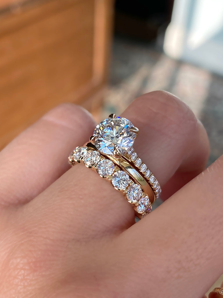 caption:shown with a 2ct center stone, with Krutz and Caitlin wedding bands