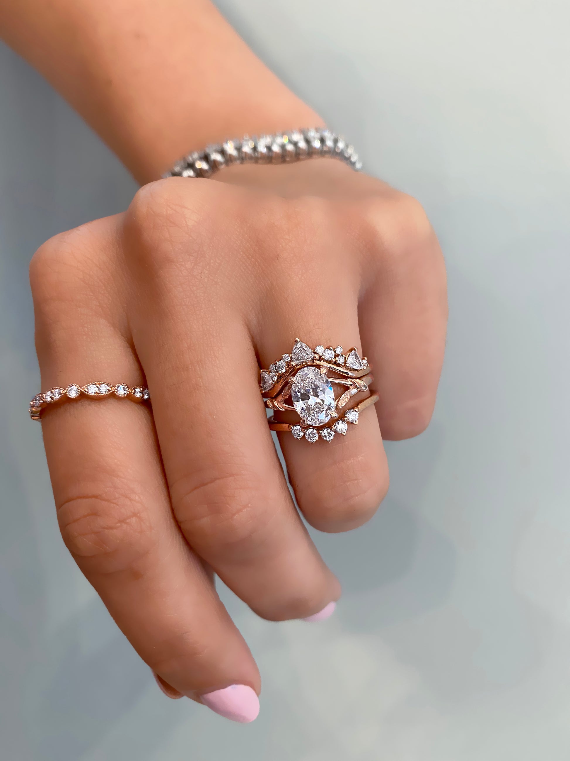 caption:Shown in 14k rose gold with 1.5ct oval diamond optoin