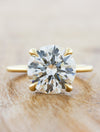 caption:Shown with 3ct round cut in 14k yellow gold 