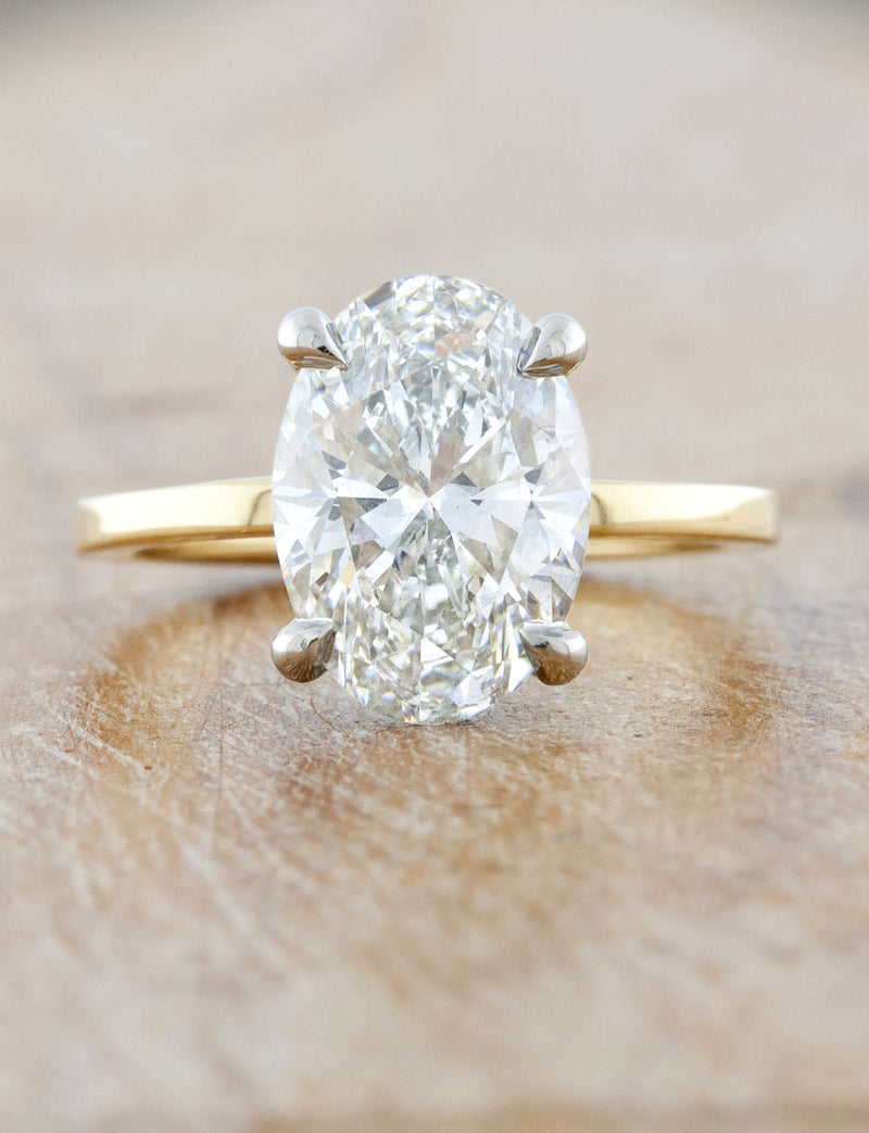 caption:Shown with 2.50ct oval in mixed 14k yellow gold & platinum setting