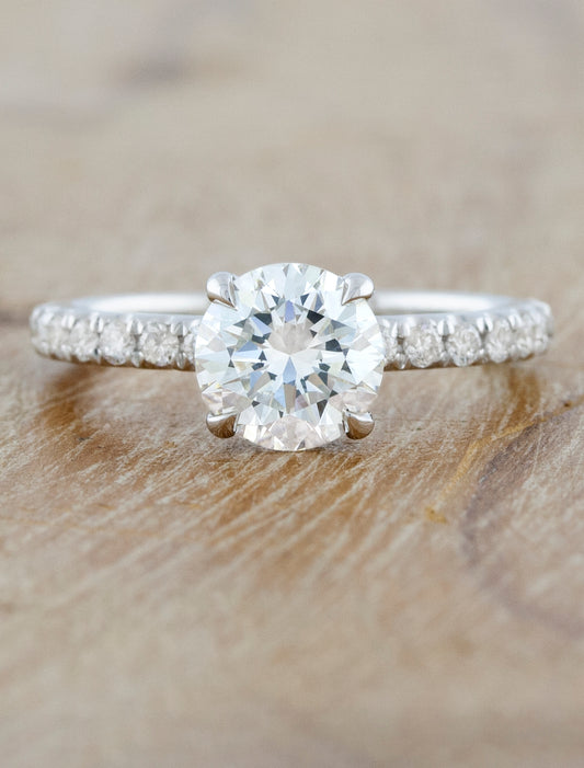 caption:Shown with 1ct round diamond in platinum