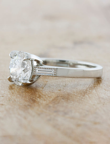 caption:Shown in platinum with a 2ct center diamond