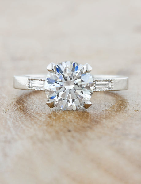 caption:Shown in platinum with a 2ct center diamond