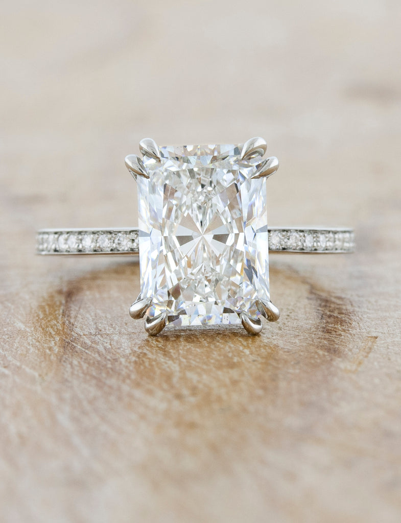 caption:Shown with a 3.3ct center diamond in platinum, customized with double claw prongs