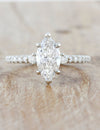 caption:Shown with 1.50ct marquise diamond in platinum