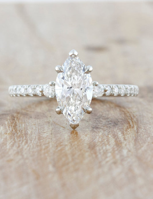 caption:Shown with 1.50ct marquise diamond in platinum