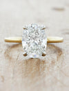 caption:Shown with 2.2ct oval diamond in mixed 14k yellow & platinum