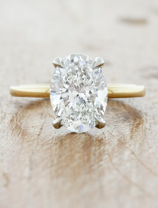 caption:Shown with 2.2ct oval diamond in mixed 14k yellow & platinum