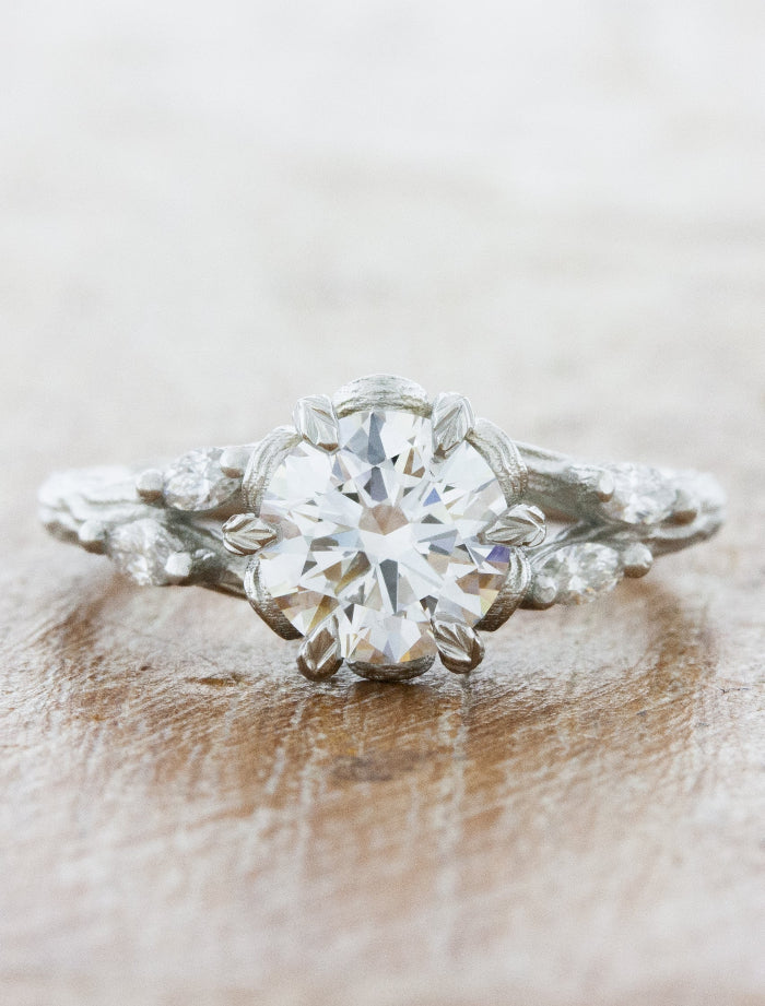 caption:Shown with 1ct round diamond in platinum