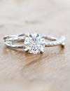 caption:Shown wit 1.21ct round diamond in platinum
