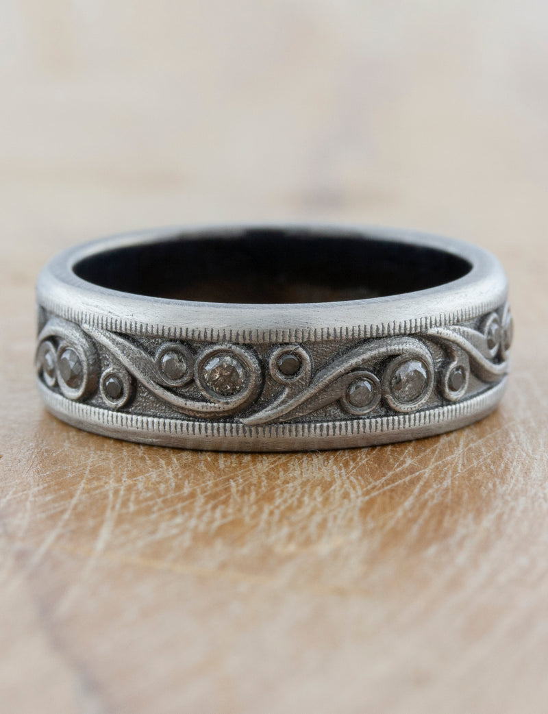 caption:Shown in platinum with black rhodium plating