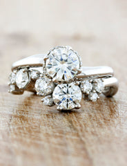 caption:Shown in platinum, paired with Novella engagement ring