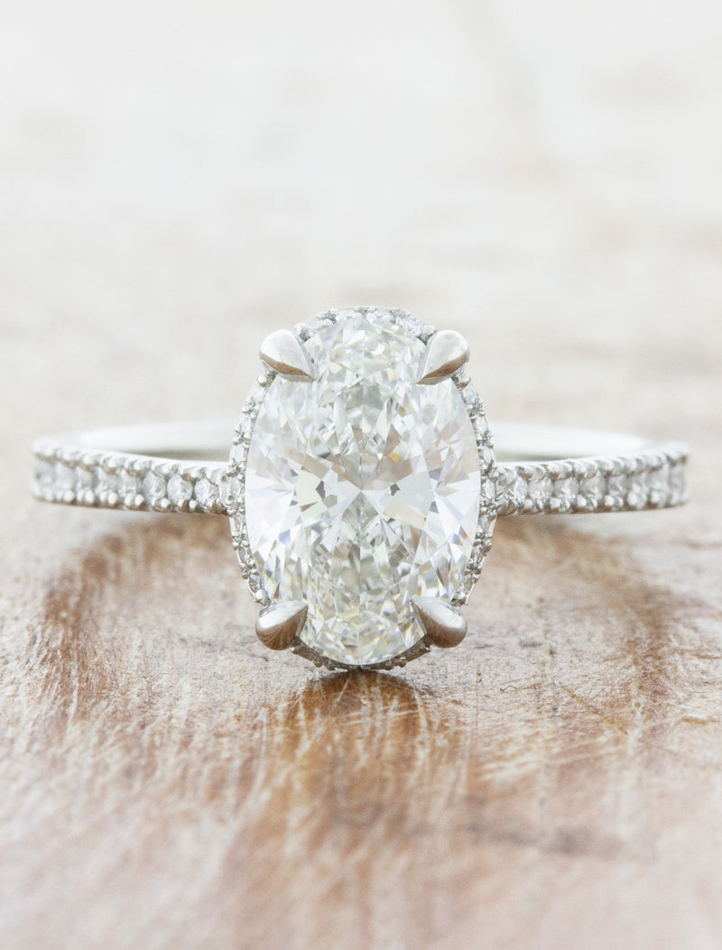caption:Shown with 2.0ct oval diamond in platinum
