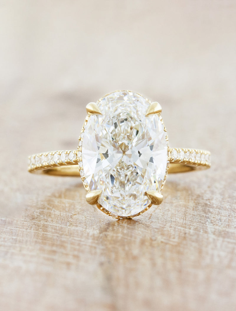 caption:Shown with 3ct oval diamond in 14k yellow gold