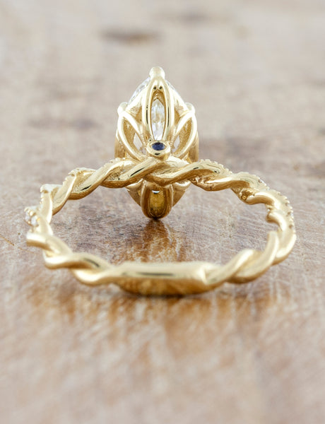 caption:Shown in 14k yellow gold option, customized with sapphire